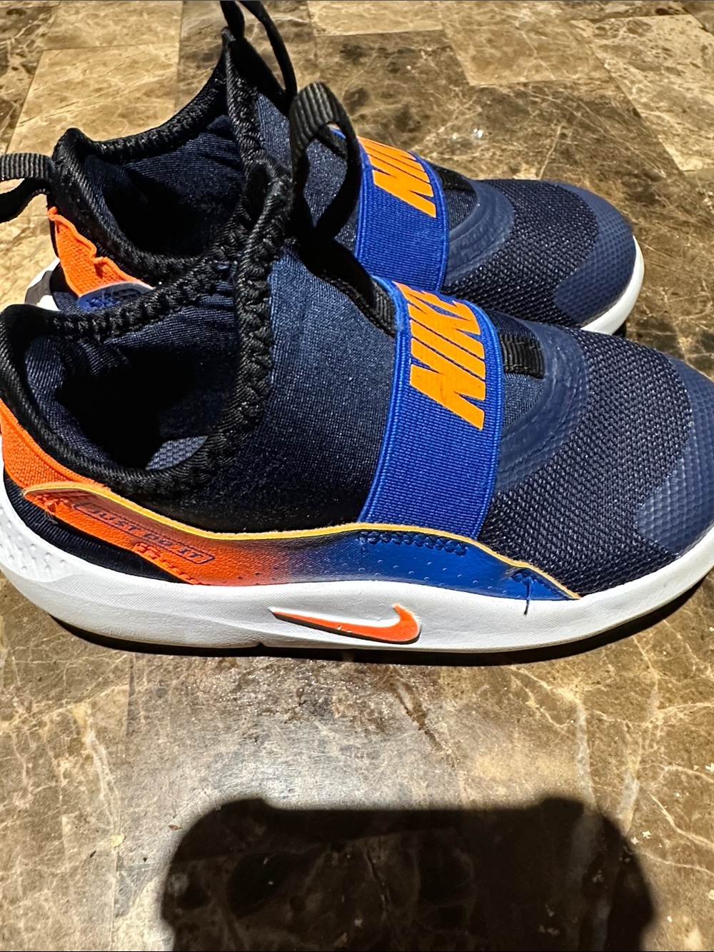 Nike Kids Navy and Orange Slip-On Athletic Sneakers